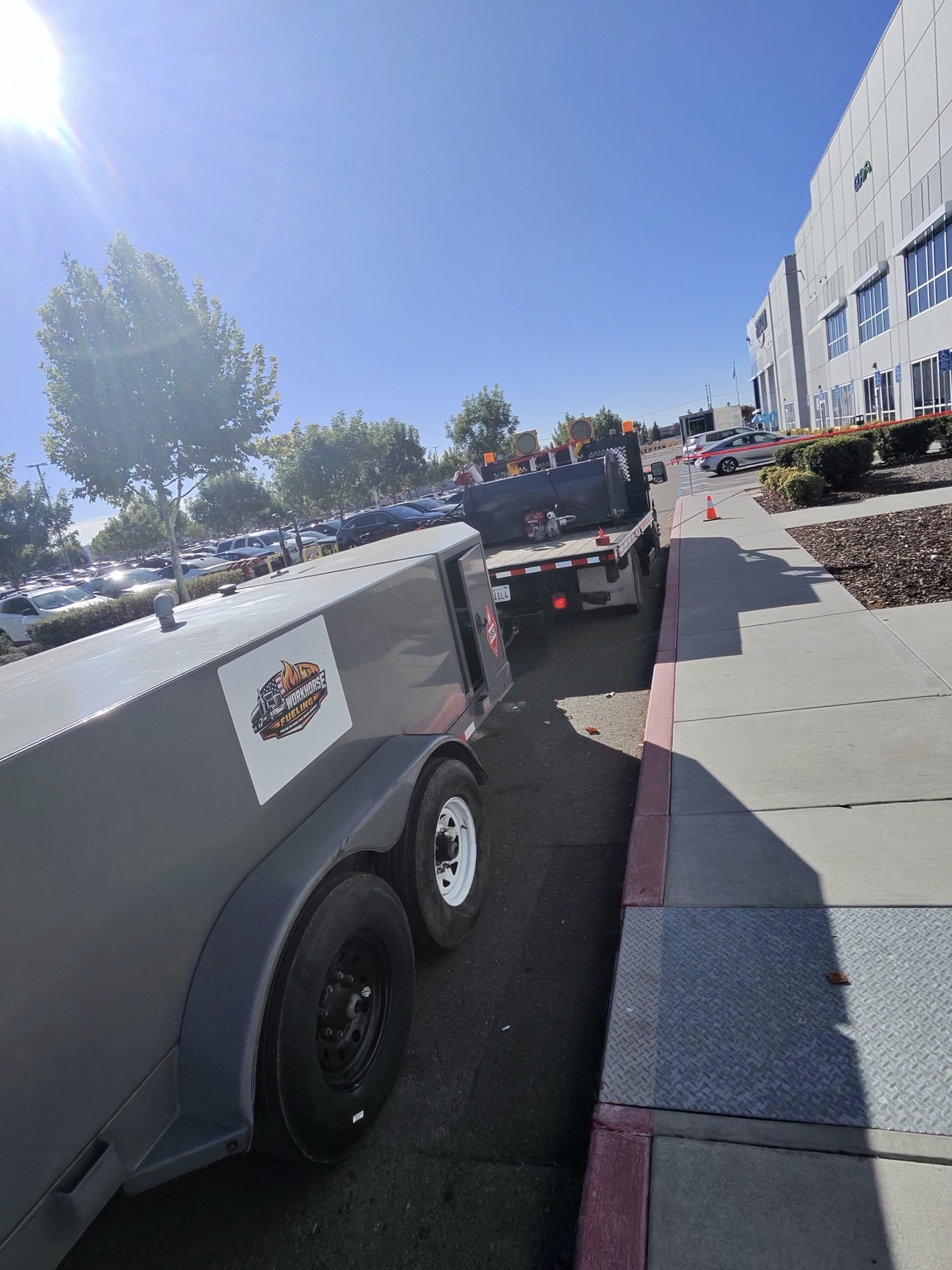 Workhorse fuel trailer and truck alongside the Amazon facility